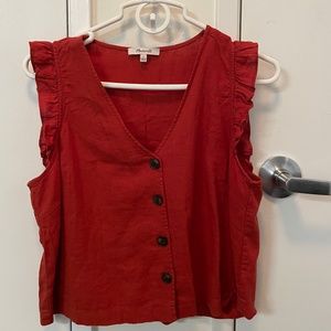 Cropped burnt orange top with frilly shoulders